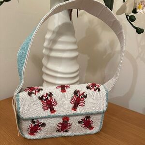 NWOT SOL AND MER Beaded Lobster
Baguette Bag White Red Blue
NWT Viral TikTok